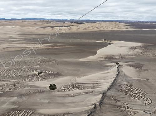 Biosphoto | 2622120 | Barchan dunes and sand patterns at the edge of the Namib Desert. Aerial view. Drone shot. Skeleton Coast, Namibia. | &copy; Thomas Dressler / Biosphoto