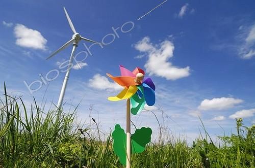 Biosphoto | 1509767 | Colourful pinwheel and a wind turbine, symbolic image for wind energy | &copy; Christian Ohde / imageBROKER / Biosphoto