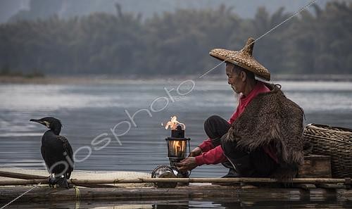 Biosphoto | 2078530 | Cormorant fishing on the Li River, Guangxi, China | &copy; Alexandre Sattler / Biosphoto