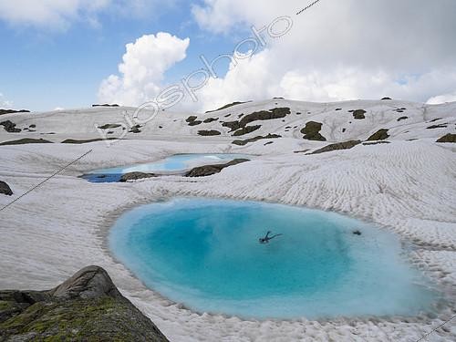 Biosphoto | 2090873 | Dive under the ice in a thawing high mountain lake. lac Noir, Haute-Savoie (74), Aiguilles Rouge National Nature Reserve, Alps, France | &copy; Rémi Masson / Biosphoto