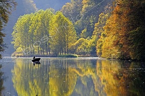 Biosphoto | 1480240 | Fisherman in a boat in the fall Doubs Valley France | &copy; Dominique Delfino / Biosphoto