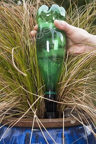Biosphoto | 728289 | Installation of a solar watering system  Oriaz  | &copy; NouN / Biosphoto