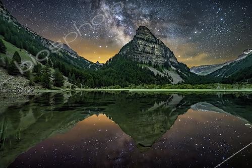 Biosphoto | 2610279 | Lac des Sagnes on a summer's night in Ubaye. The Milky Way takes shape in the middle of the night above the lake and the Tour des Sagnes in Ubaye, in the southern Alps. Hautes-Alpes, France | &copy; Jean-Philippe Delobelle / Biosphoto