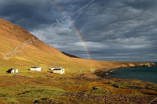 Biosphoto | 2589231 | Rainbow over the hamlet of Stewart Island on Greenland's east coast | &copy; Pierre Vernay / Biosphoto