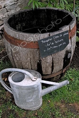 Biosphoto | 113845 | Rainwater stocking barrel and watering can France | &copy; Denis Bringard / Biosphoto