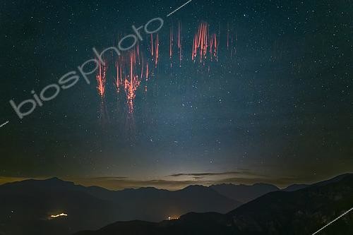 Biosphoto | 2590711 | Sprites above a thunderstorm near Lyon. Facing the Alps, red sprites above a thunderstorm in Lyon from Alpes-Maritimes, France | &copy; Christophe Suarez / Biosphoto