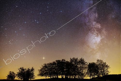 Biosphoto | 2419315 | The Milky Way in the sky of Jura mountains. Mars is visible at the bottom left, The sky is illuminated by light pollution of nearby cities, despite the altitude. | &copy; Jean-Philippe Delobelle / Biosphoto
