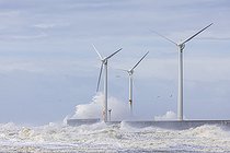 Biosphoto | 2579483 | Waves hitting the wind turbines on the Carnot dyke in Boulogne-sur-mer, during storm Pierrick, Pas-de-Calais, Côte d'Opale, France | &copy; Yann Avril / Biosphoto