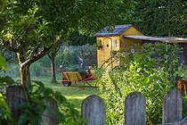 Biosphoto | 2084090 | Wheelbarrow and shed in vegetable garden, Provence, France | &copy; Philippe Giraud / Biosgarden / Biosphoto