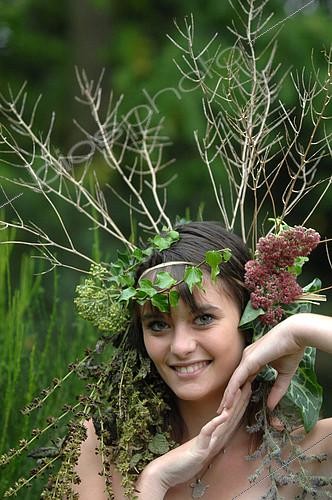 Biosphoto | 2073111 | Young woman with crown flowers on her head - living in harmony with nature - reconnecting with nature | &copy; Catherine Fruhinsholz / Biosphoto